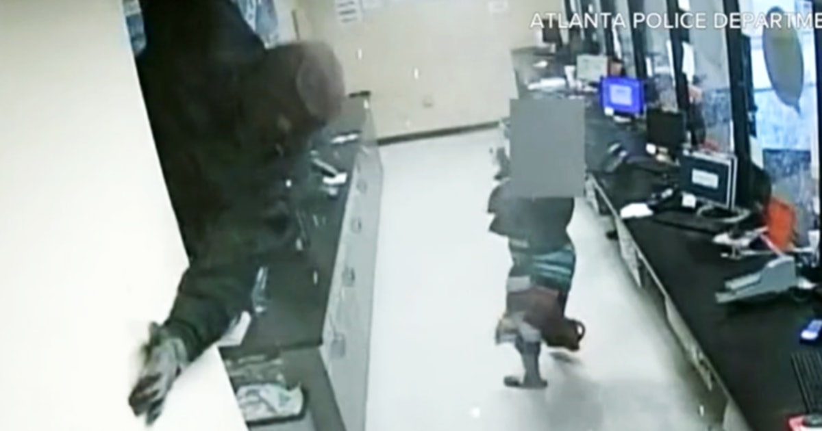 Video shows robbers drop into check cashing store from ceiling in $150,000 heist