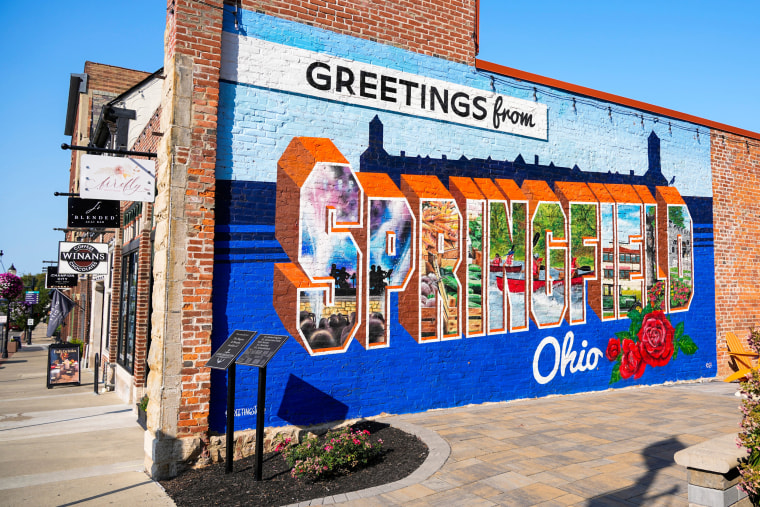 A mural that says, “Greetings from Springfield Ohio” in downtown Springfield.