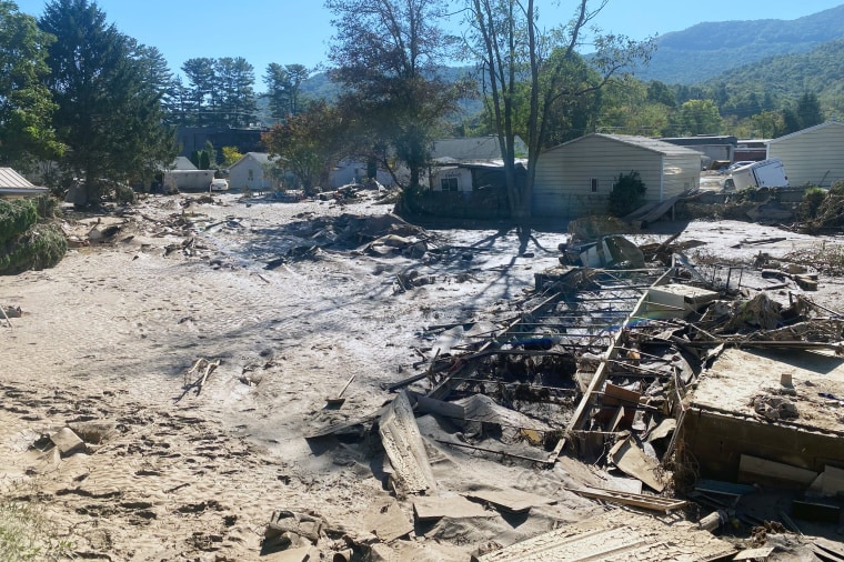 After the floodwaters subsided, roads were left covered in debris and mud.