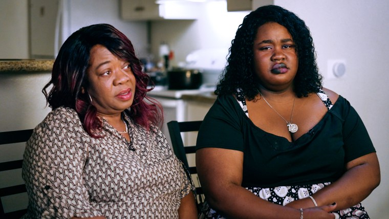 La'Tannya Banks, left, and Lelah Banks sit next to each other as La'Tannya speaks