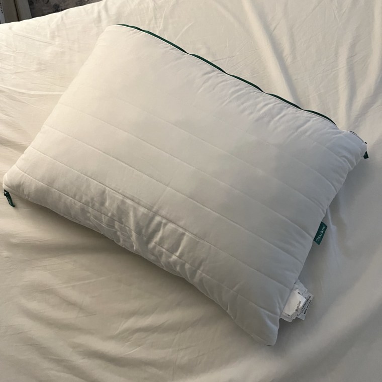 Close-up shot showing the pillow’s breathable cotton shell.