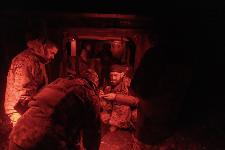 Ukrainian servicemen prepare to go to the frontline near Kurakhove in eastern Donetsk on Oct. 14, 2024.