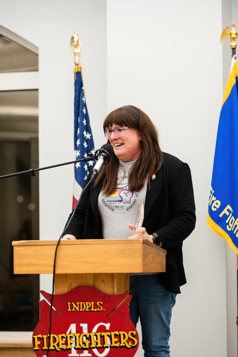 Veronica Pejril standing at lectern 