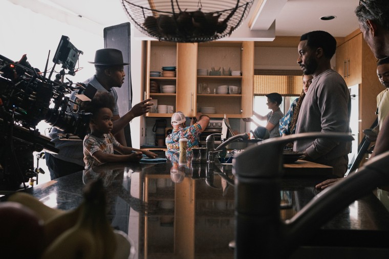 "Exhibiting Forgiveness" filmmaker Titus Kaphar behind the scenes with André Holland who plays Tarrell.