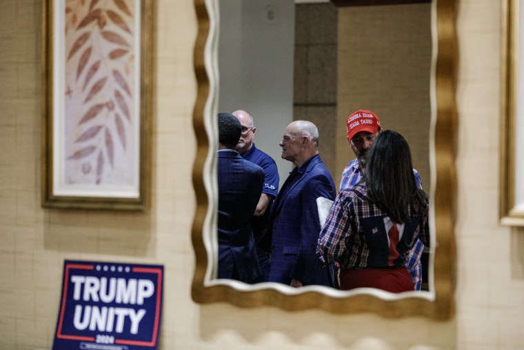 People gather in a lobby