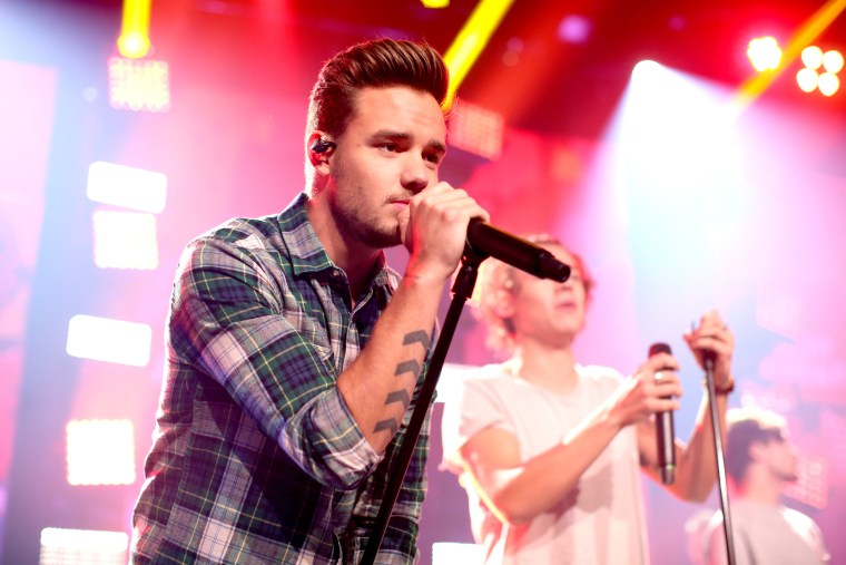 Liam Payne performing with One Direction.