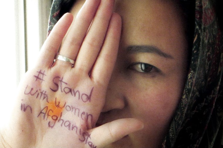 #standwithwomeninafghanistan on a woman's palm