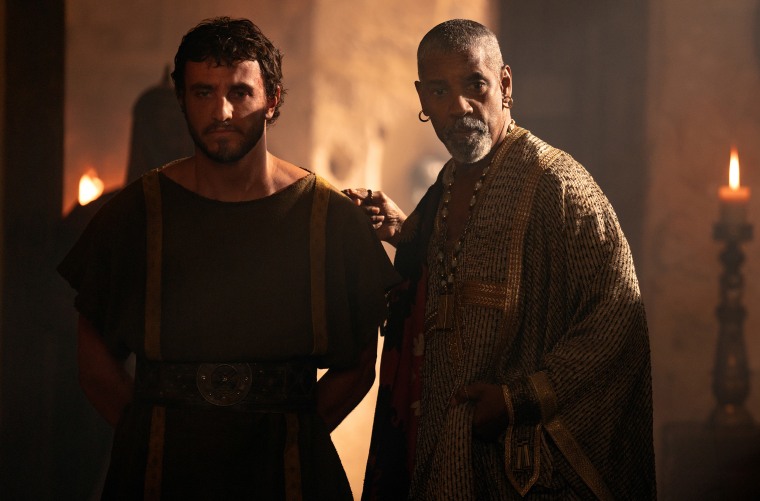 Denzel Washington as Macrinus and Paul Mescal as Lucius  in  a scene from "Gladiator II"