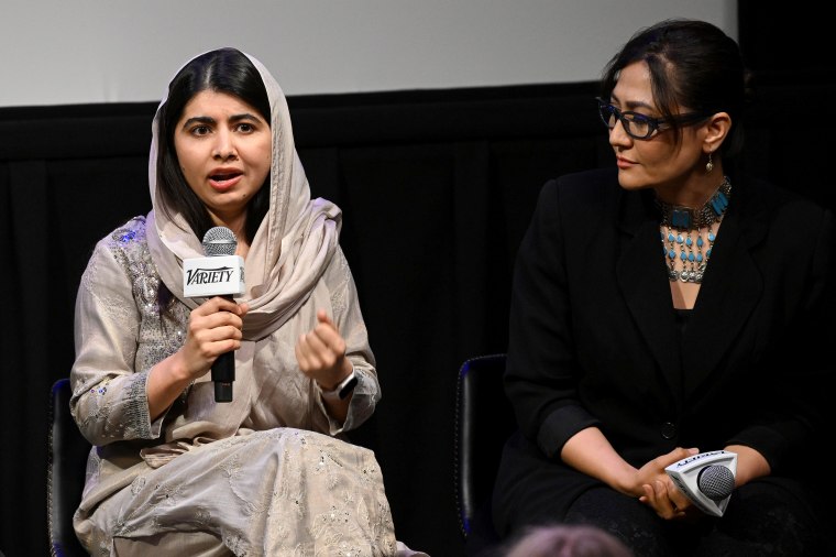 Malala Yousafzai and Sahra Mani speak onstage 